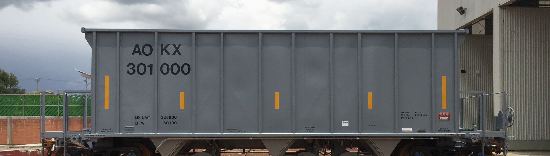 Dura-Max 2,400 cubic feet open-top hopper railcar.