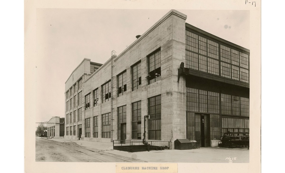 Vintage photograph showing a large brick building