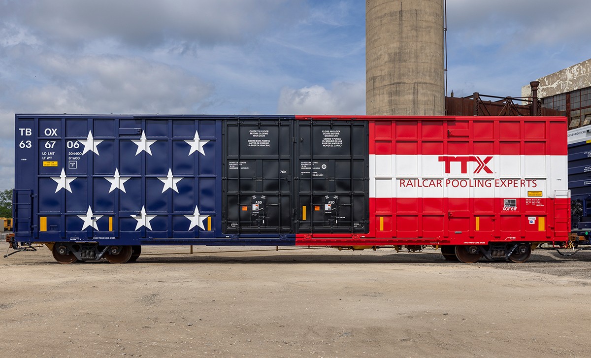 GBX and TTX boxcar painted with white stars and red and white stripes